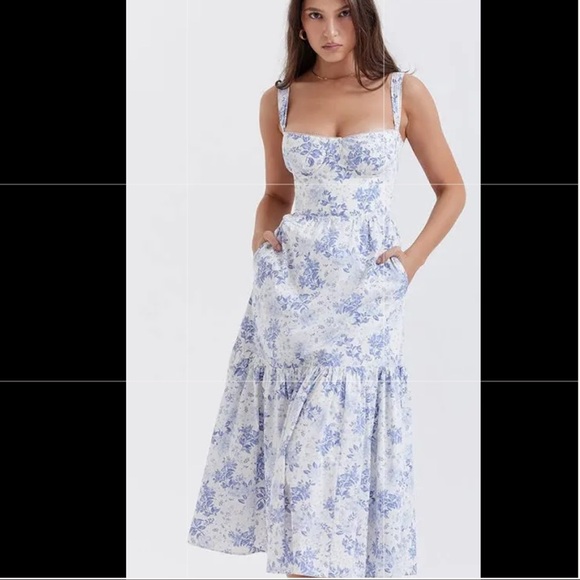 NWT Gorgeous white maxi dress with blue floral print, featuring a corset top. - Picture 1 of 5